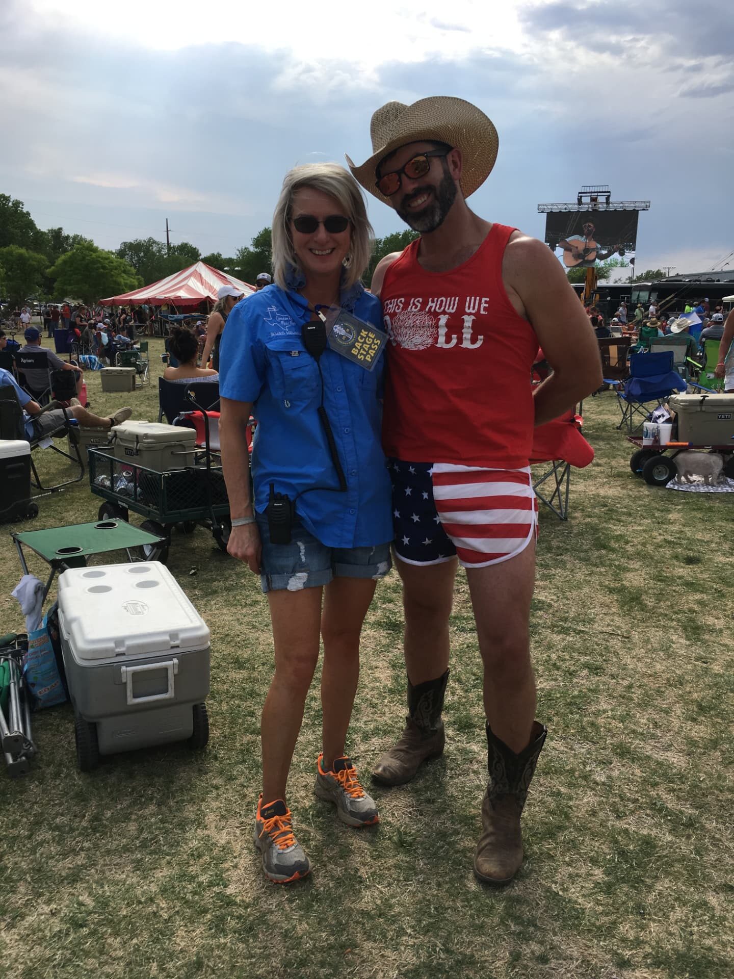 Friends in cowboy hats hanging out on the festival grounds